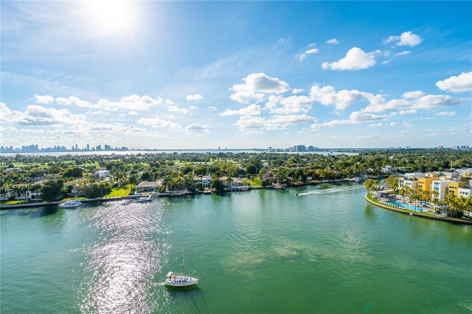5880 Collins Avenue, Unit PH3 Miami Beach, FL 33140 - Photo 13 of 34 an aerial view of a houses with lake view