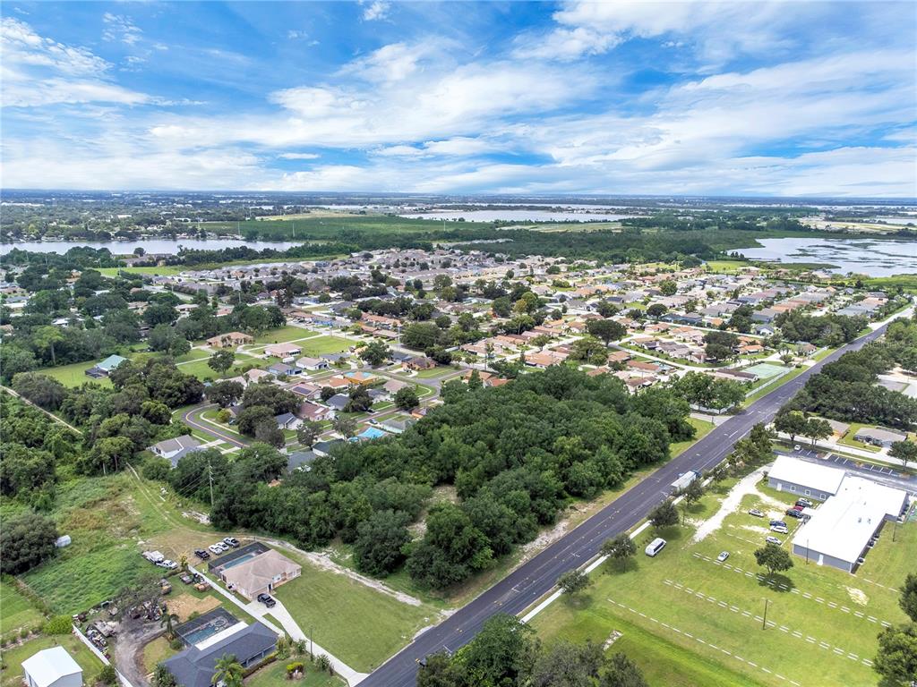 2400 Lake Buckeye Road Winter Haven, FL 33881 - Photo 12 of 16 an aerial view of residential houses with outdoor space