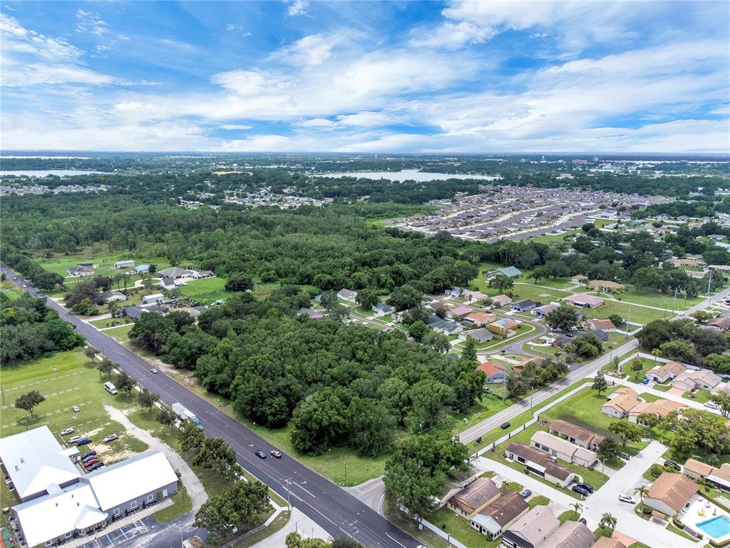2400 Lake Buckeye Road Winter Haven, FL 33881 - Photo 16 of 16 an aerial view of residential houses with outdoor space