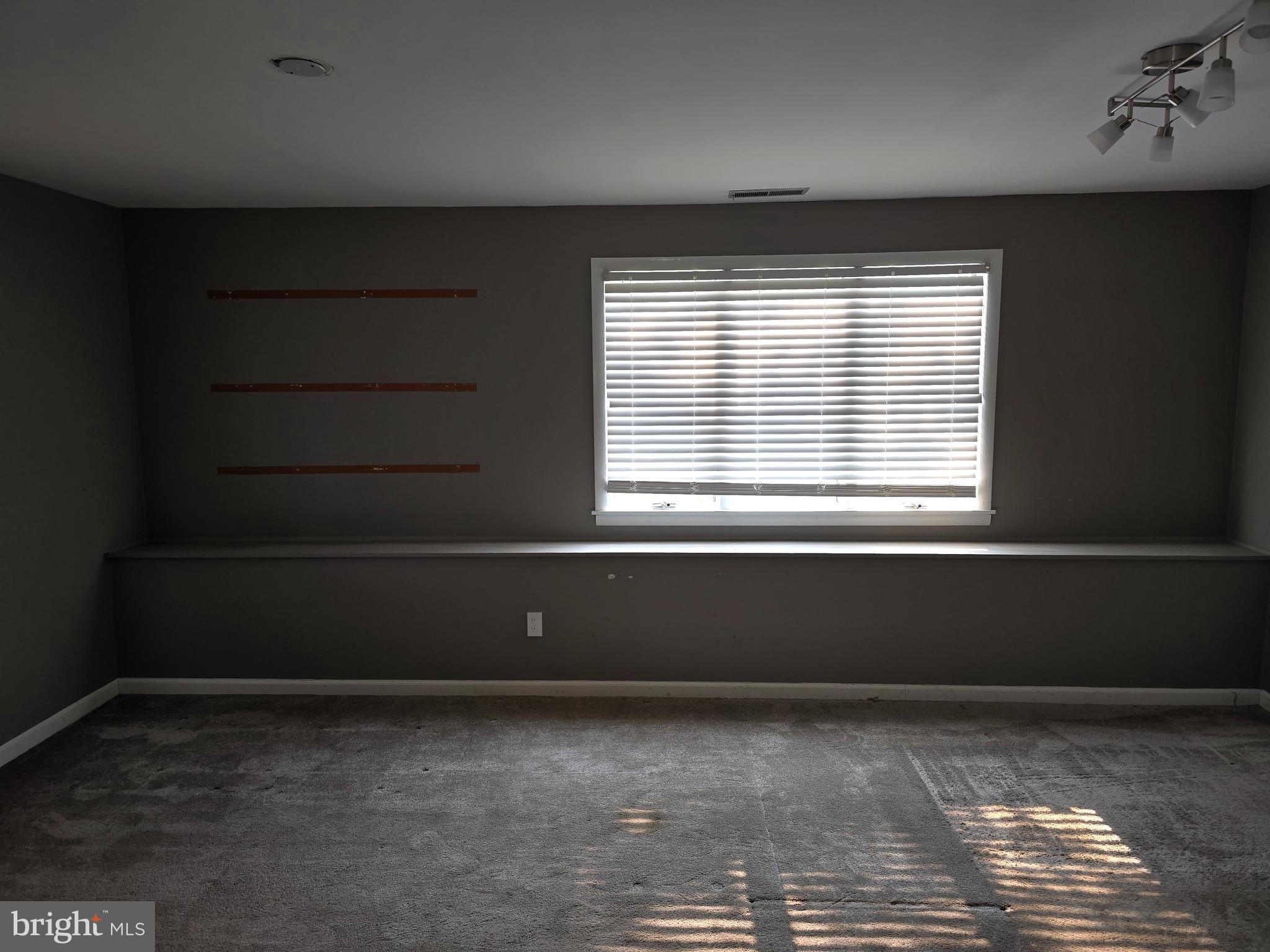 8343 Scotts Level Road Pikesville, MD 21208 - Photo 22 of 33 a room that has a window in it