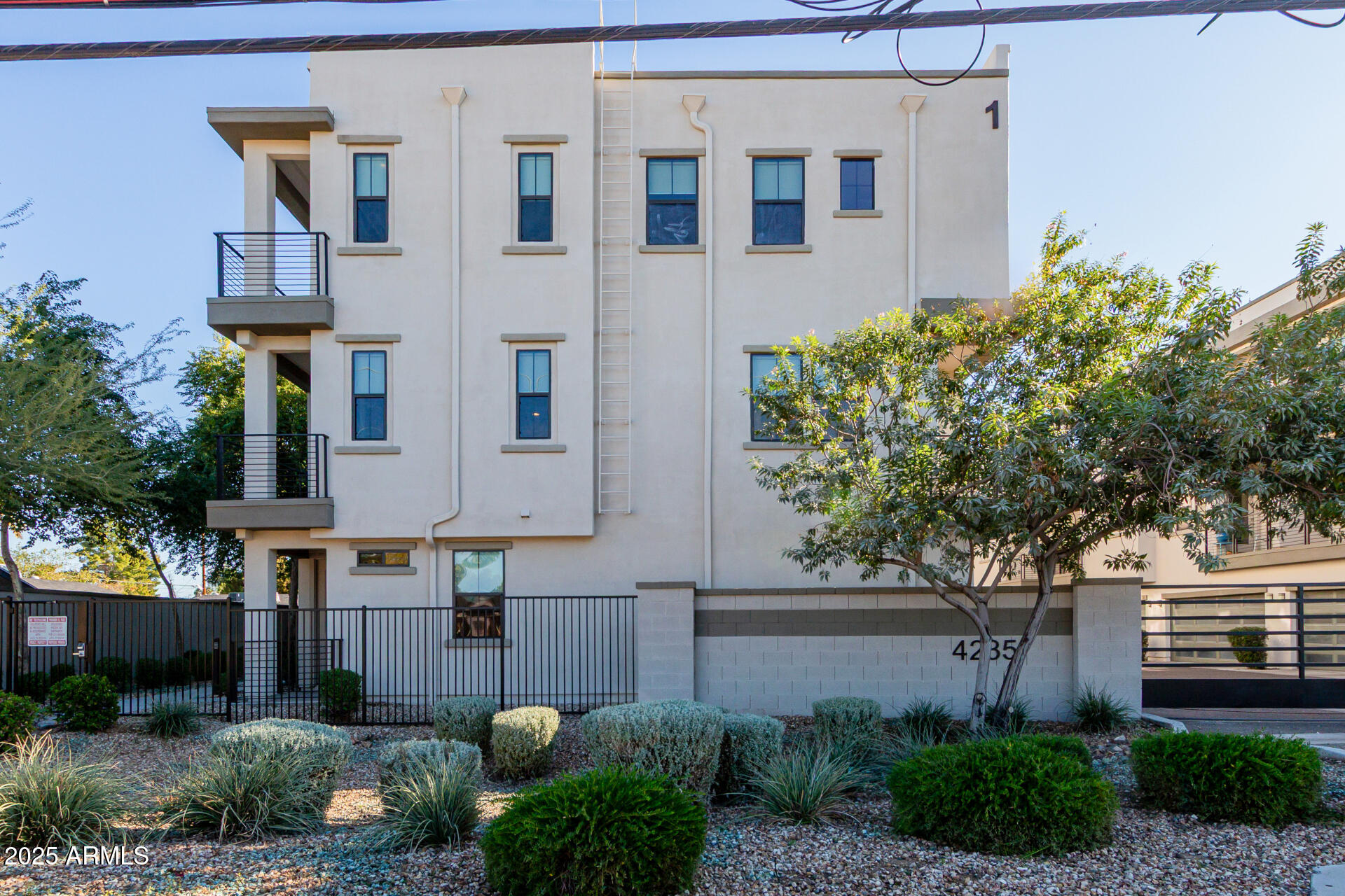 4235 North 26th Street, Unit 1 Phoenix, AZ 85016 - Photo 1 of 62 a house view with a garden space