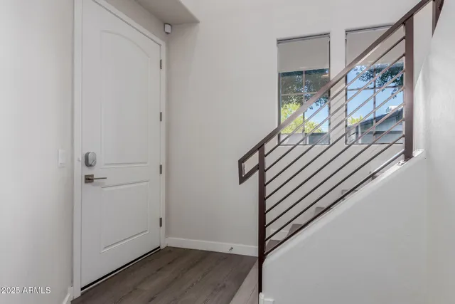 a view of a brick house with a street
