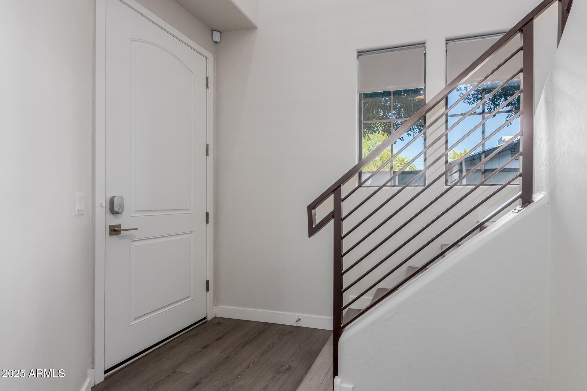4235 North 26th Street, Unit 1 Phoenix, AZ 85016 - Photo 7 of 62 a view of an entryway with wooden floor