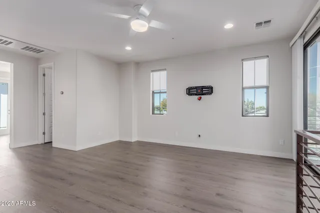 a picture of a bench in front of a window