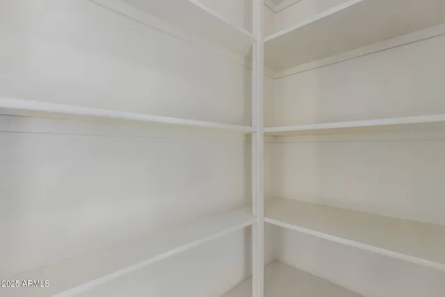 a kitchen with a sink stove and microwave