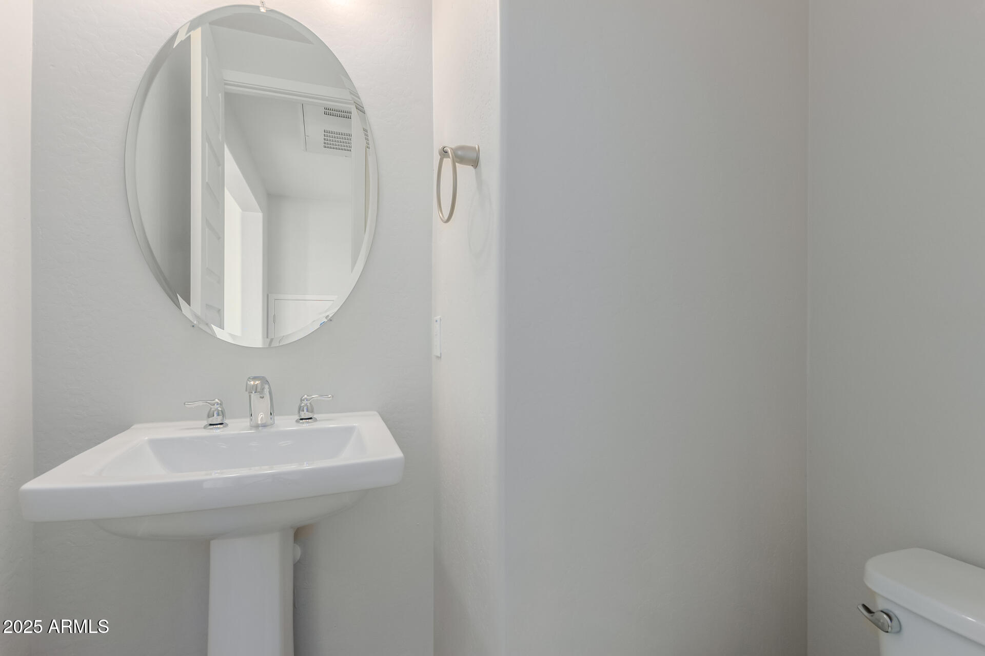 4235 North 26th Street, Unit 1 Phoenix, AZ 85016 - Photo 19 of 62 a bathroom with a sink and a mirror
