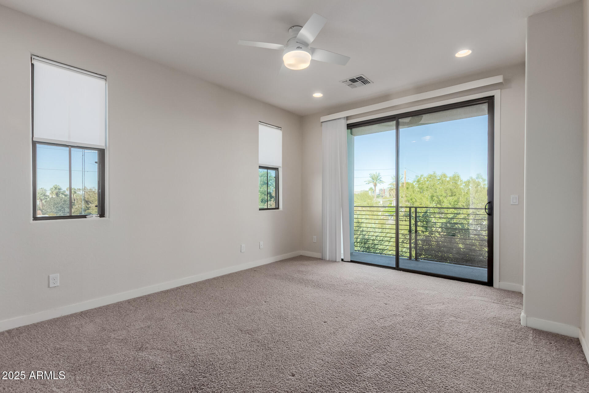 4235 North 26th Street, Unit 1 Phoenix, AZ 85016 - Photo 20 of 62 a view of an empty room with glass door