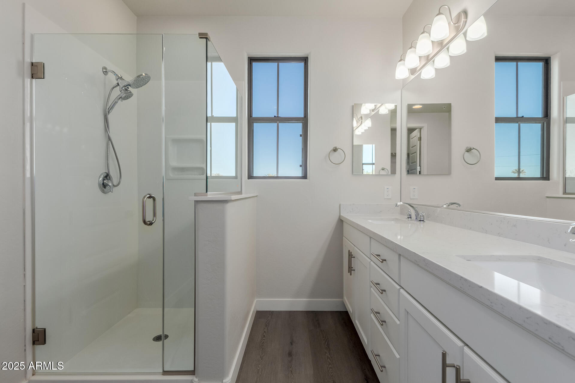 4235 North 26th Street, Unit 1 Phoenix, AZ 85016 - Photo 24 of 62 a bathroom with a double vanity sink mirror and shower