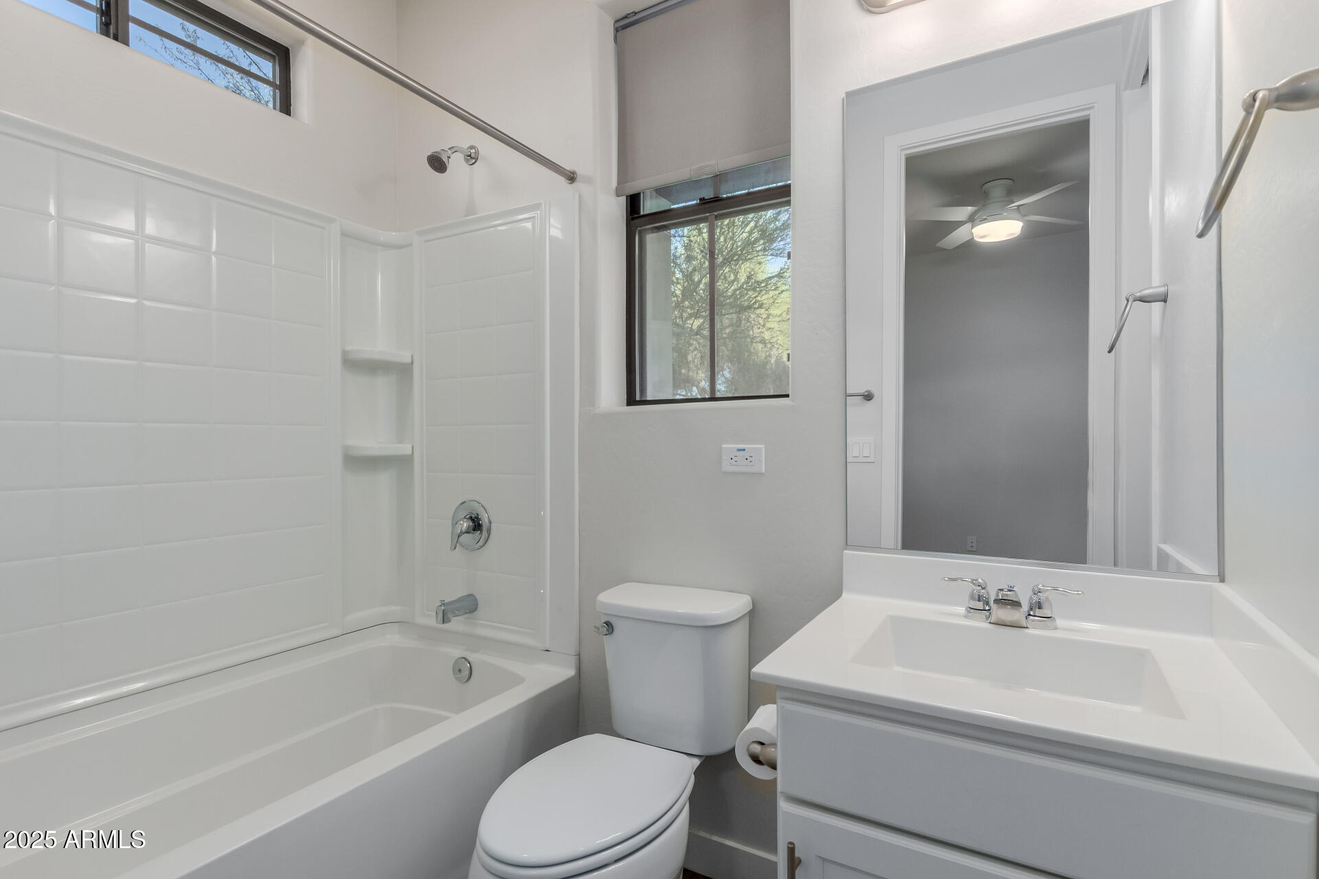 4235 North 26th Street, Unit 1 Phoenix, AZ 85016 - Photo 28 of 62 a bathroom with a toilet a sink and bathtub