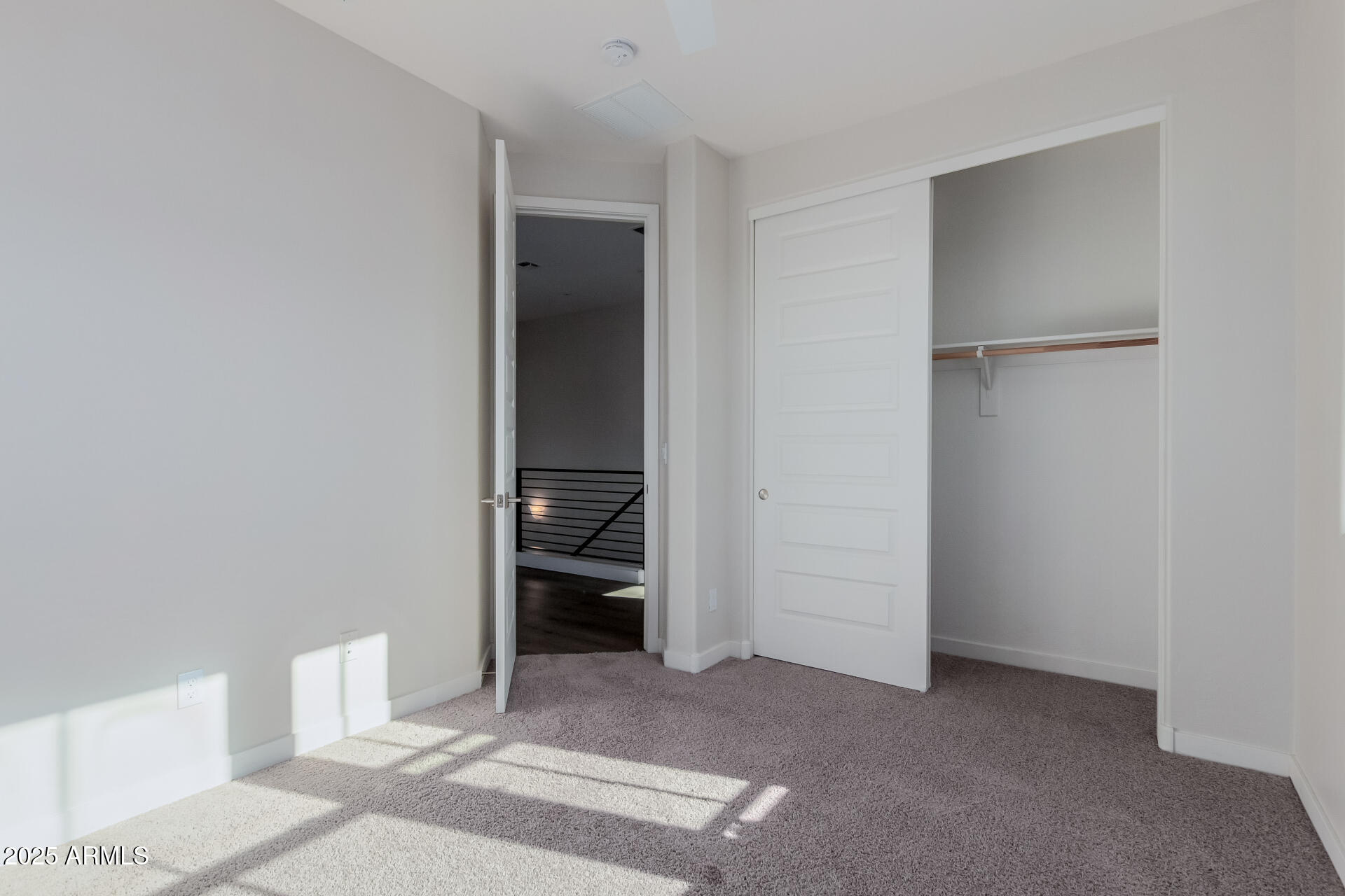 4235 North 26th Street, Unit 1 Phoenix, AZ 85016 - Photo 33 of 62 a room that has a bed and a chair in it