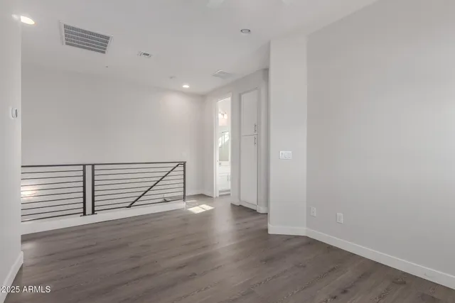 a view of a door and a window