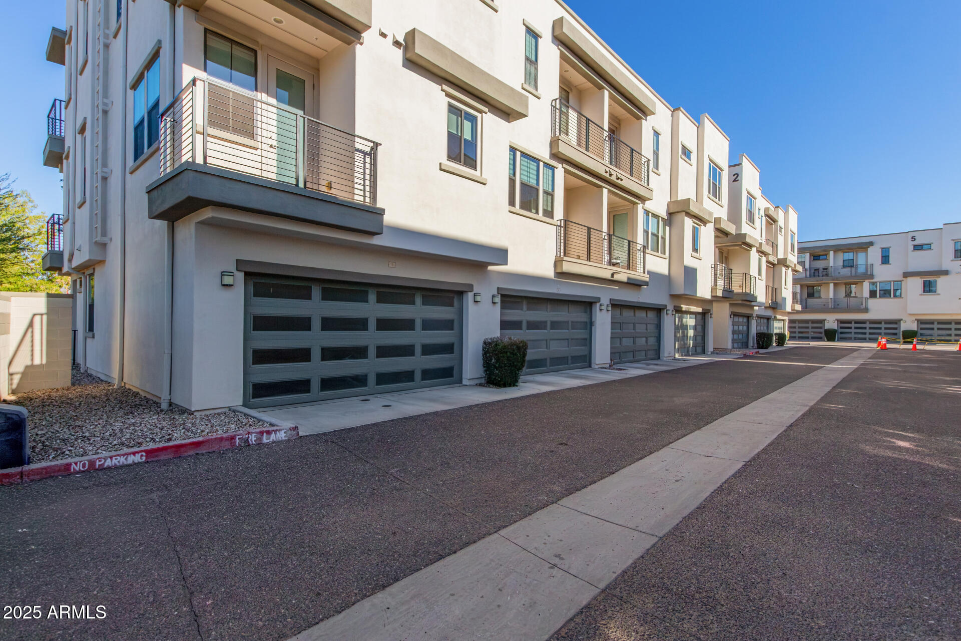 4235 North 26th Street, Unit 1 Phoenix, AZ 85016 - Photo 45 of 62 a view of a street that has couple of cars parked on road