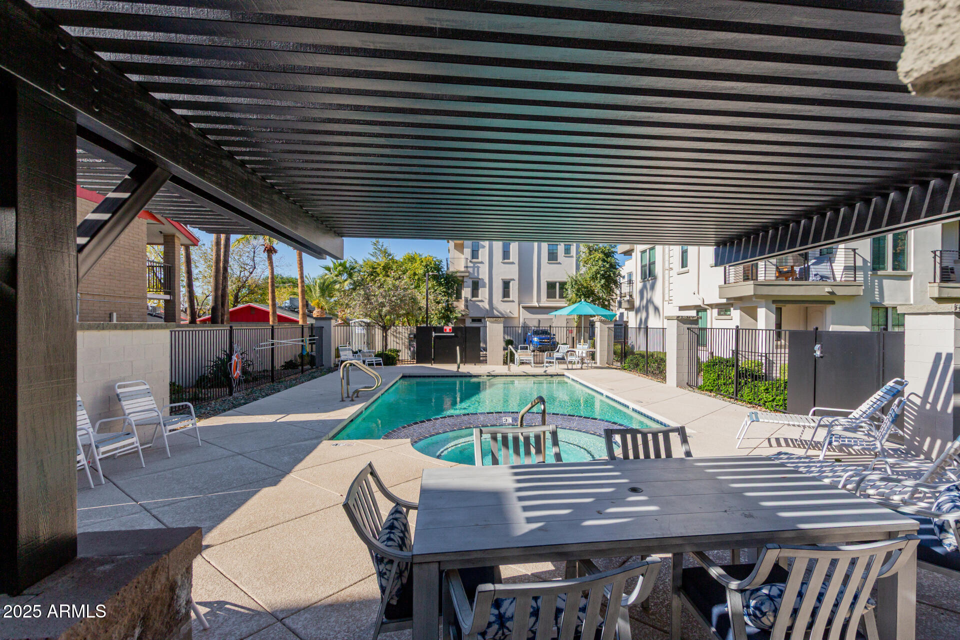 4235 North 26th Street, Unit 1 Phoenix, AZ 85016 - Photo 48 of 62 a roof deck with furniture and potted plants
