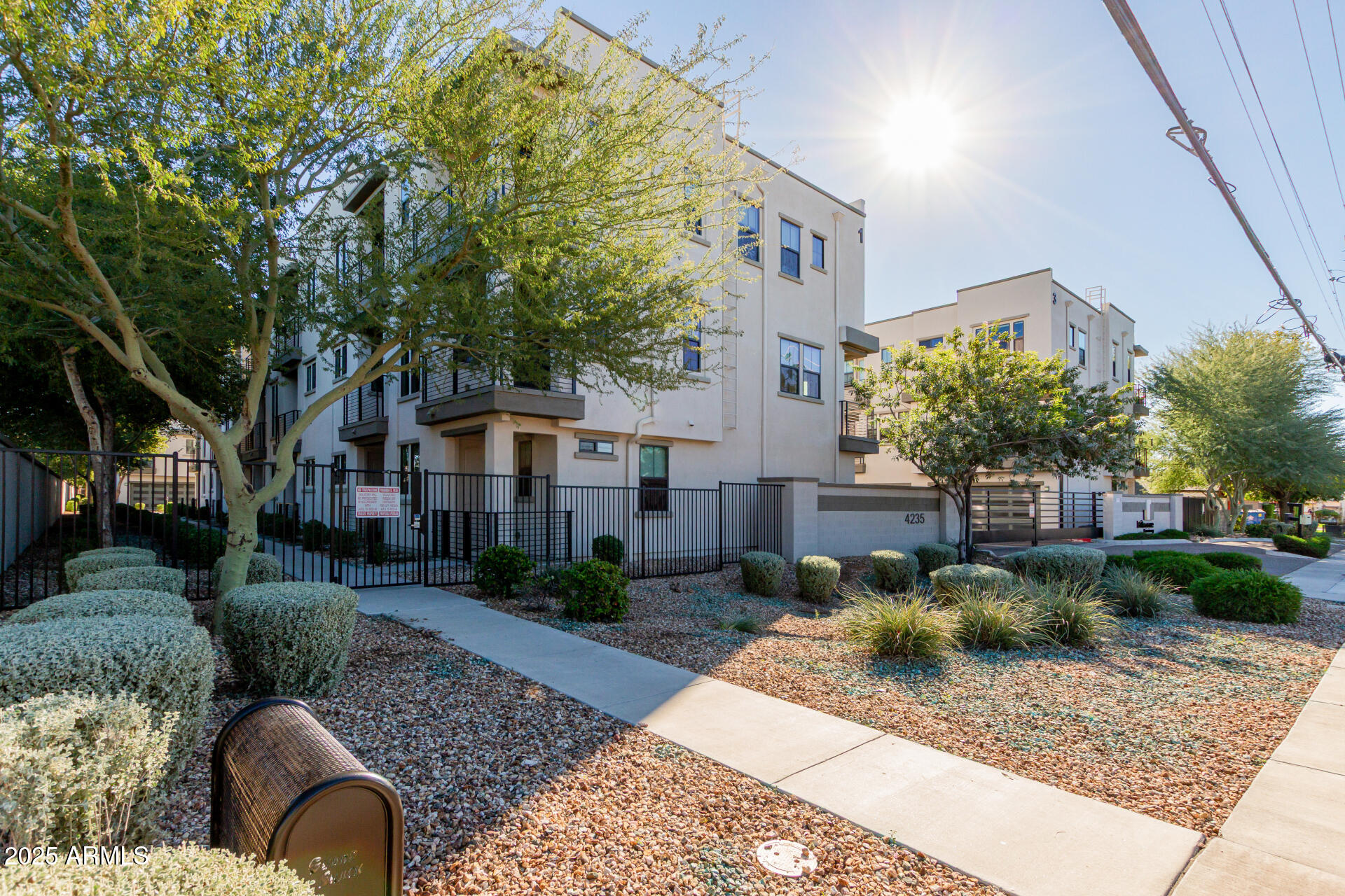 4235 North 26th Street, Unit 1 Phoenix, AZ 85016 - Photo 4 of 62 a front view of a house with garden