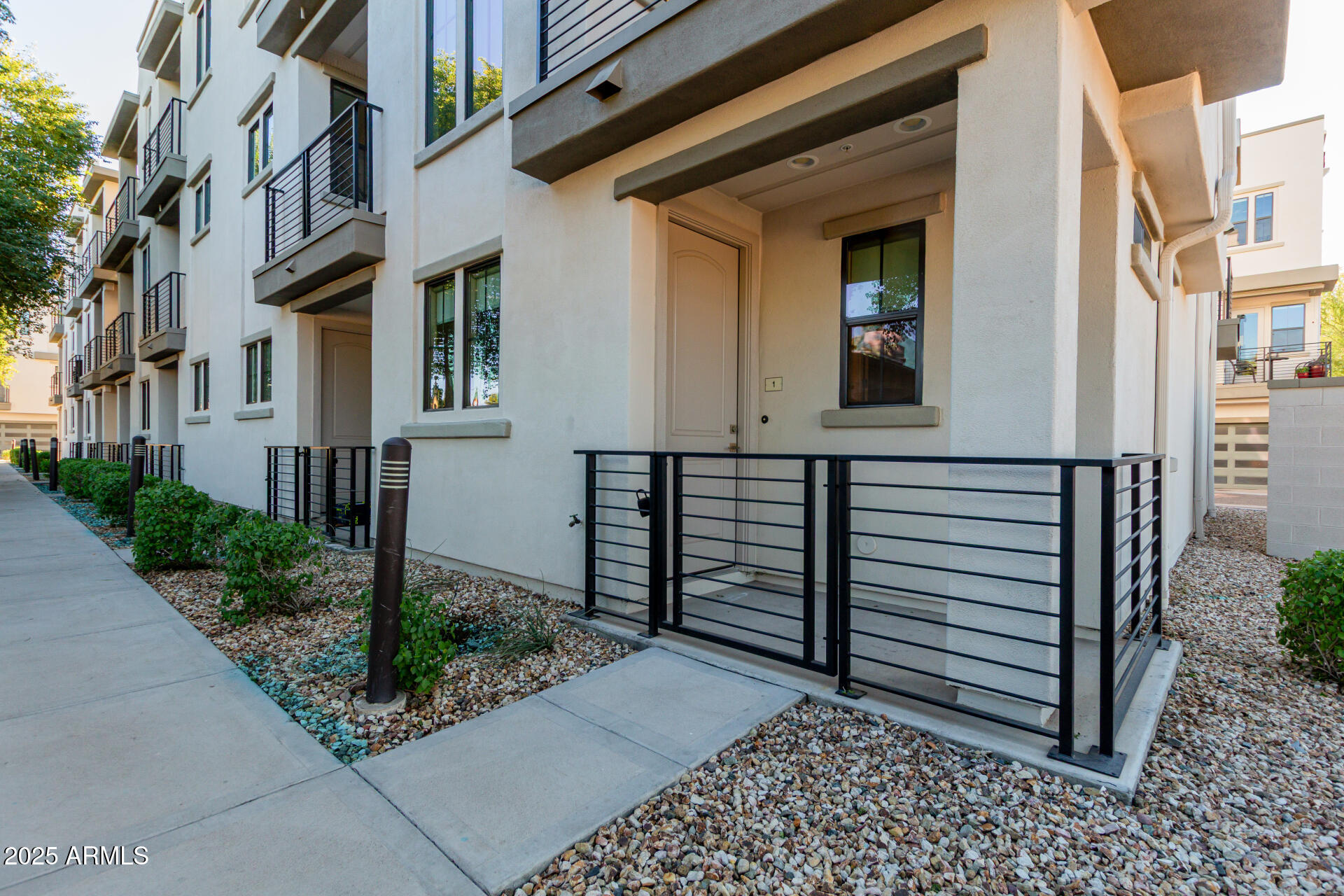 4235 North 26th Street, Unit 1 Phoenix, AZ 85016 - Photo 5 of 62 a view of a brick house with a street