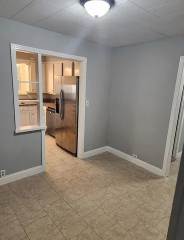 en empty room with windows