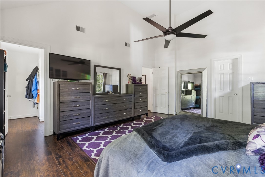 14321 Crossings Ridge Drive Midlothian, VA 23113 - Photo 31 of 43 a bedroom with a bed and a flat screen tv