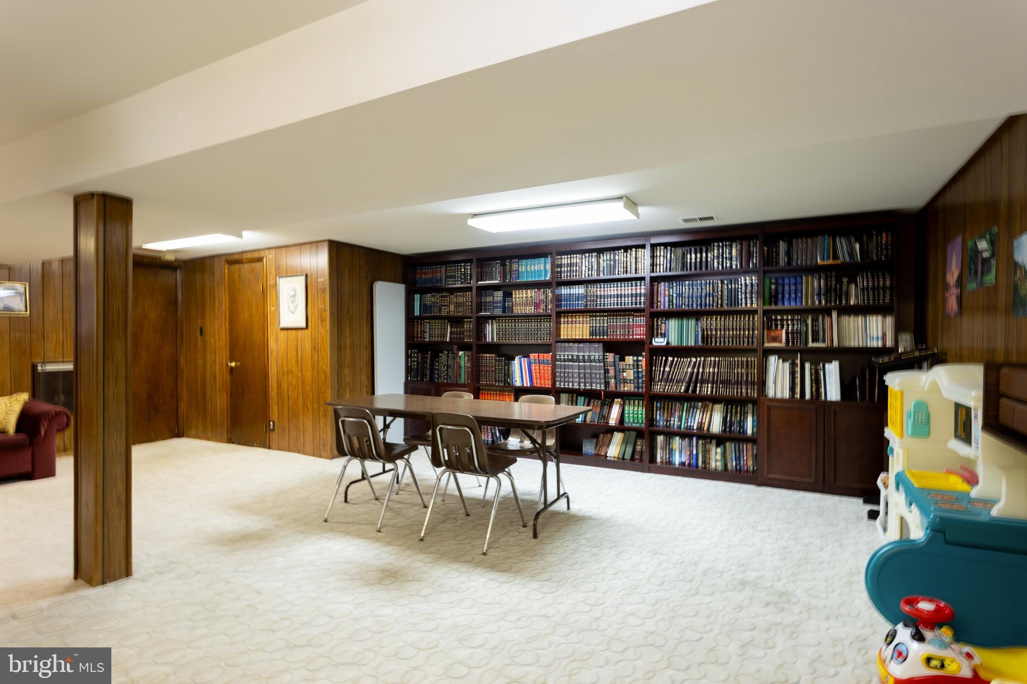 3313 Claran Road Baltimore, MD 21215 - Photo 26 of 35 a reading room with furniture and book shelf