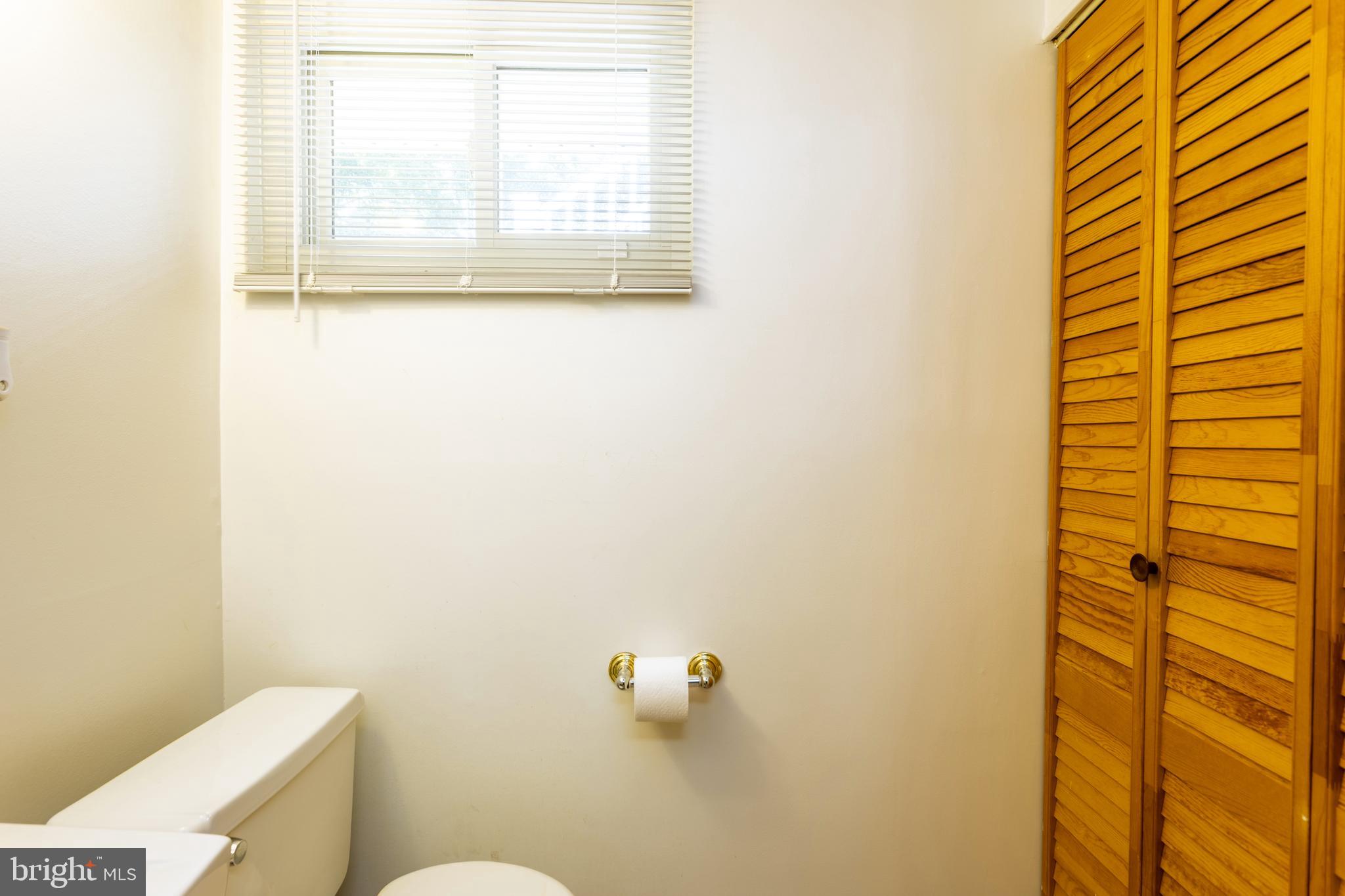 3313 Claran Road Baltimore, MD 21215 - Photo 28 of 35 a bathroom with a window