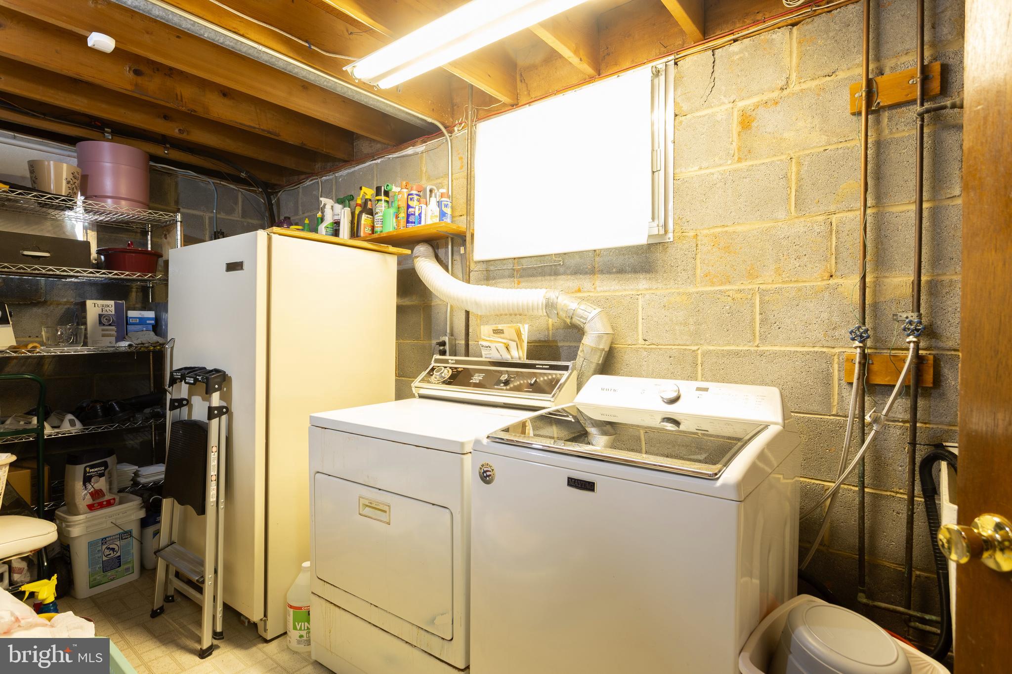 3313 Claran Road Baltimore, MD 21215 - Photo 31 of 35 a utility room with dryer and washer