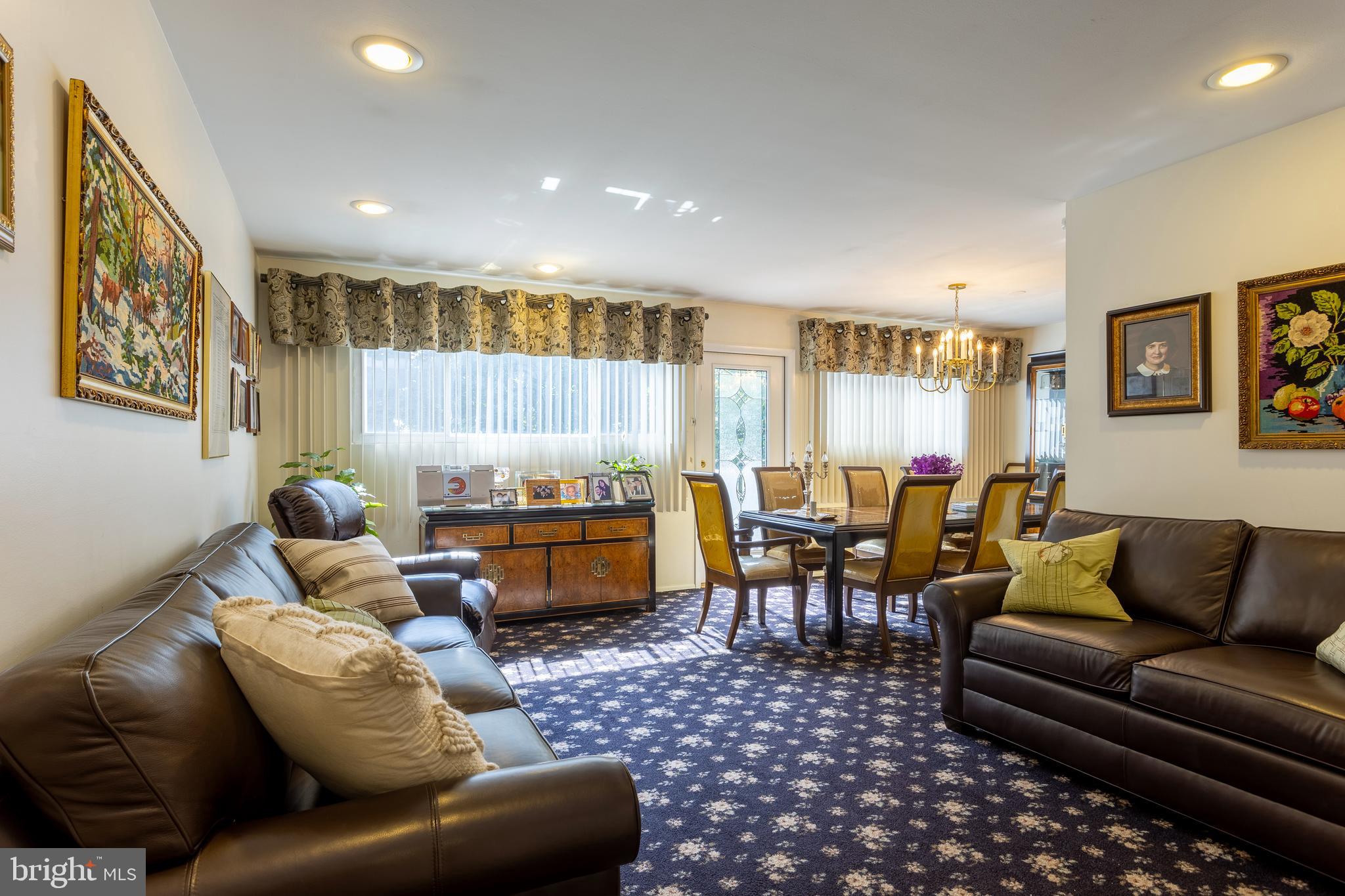 3313 Claran Road Baltimore, MD 21215 - Photo 5 of 35 a living room with furniture ceiling fan and a rug