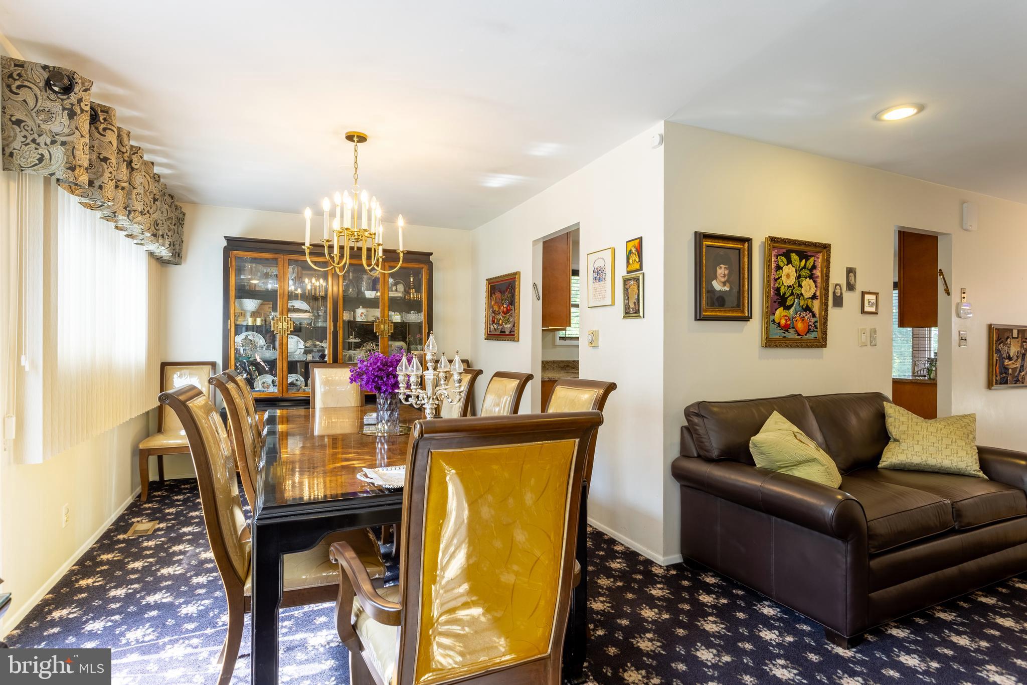 3313 Claran Road Baltimore, MD 21215 - Photo 6 of 35 a living room with furniture and a chandelier