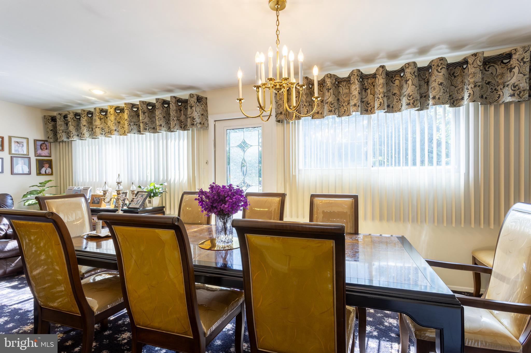 3313 Claran Road Baltimore, MD 21215 - Photo 8 of 35 a view of a dining room with furniture and window