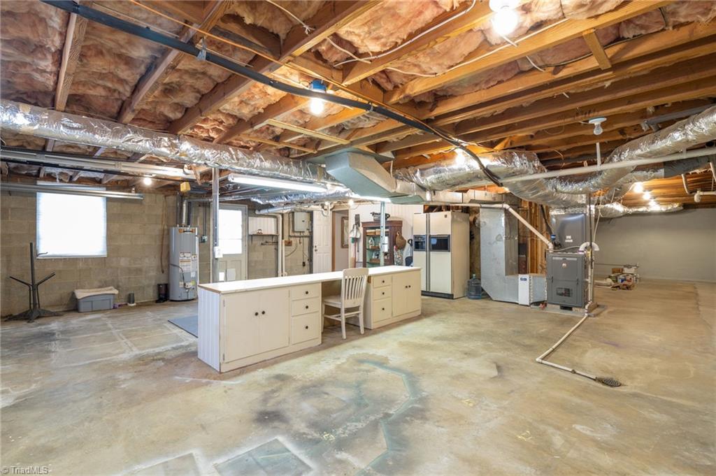 8024 Fogleman Road Oak Ridge, NC 27310 - Photo 27 of 33 Basement Garage and Utility