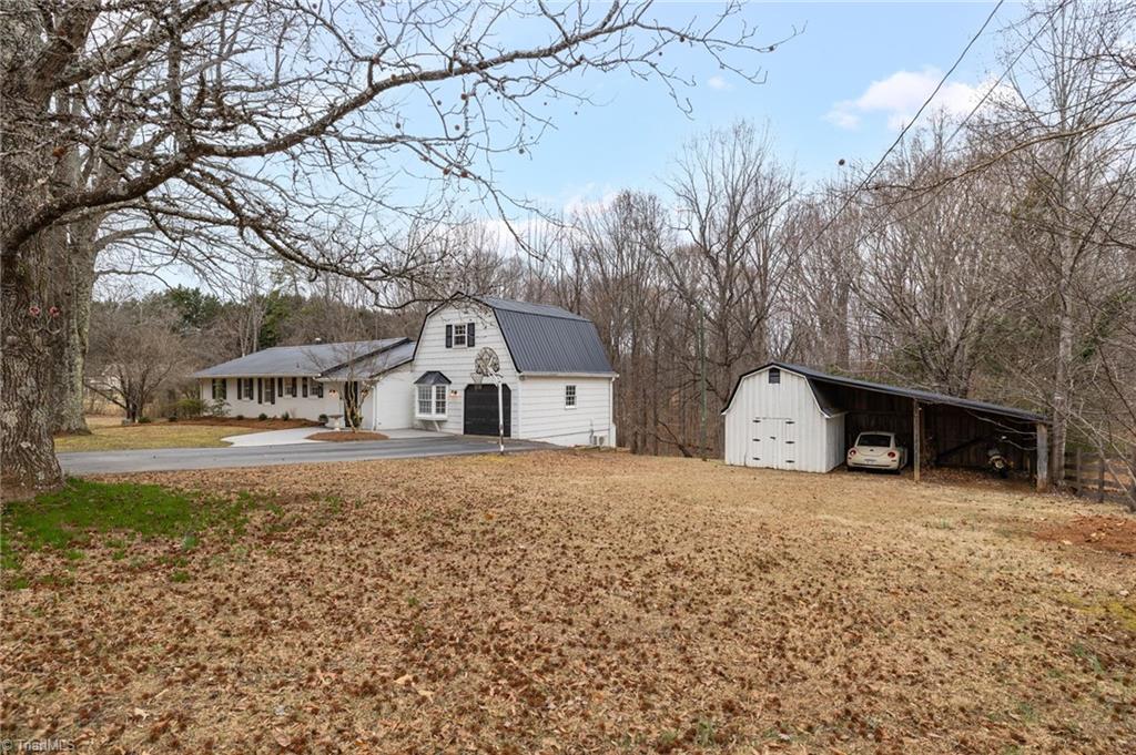 8024 Fogleman Road Oak Ridge, NC 27310 - Photo 33 of 33 Front