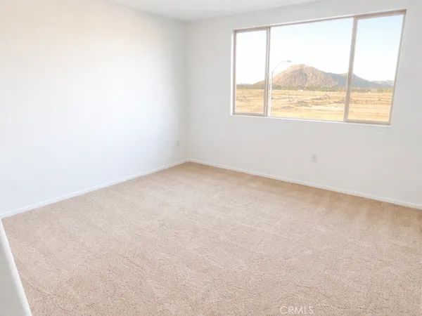 an empty room with a window