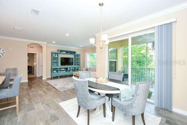 4212 Expedition Way Osprey, FL 34229 - Photo 10 of 28 a view of a dining room with furniture window and outside view