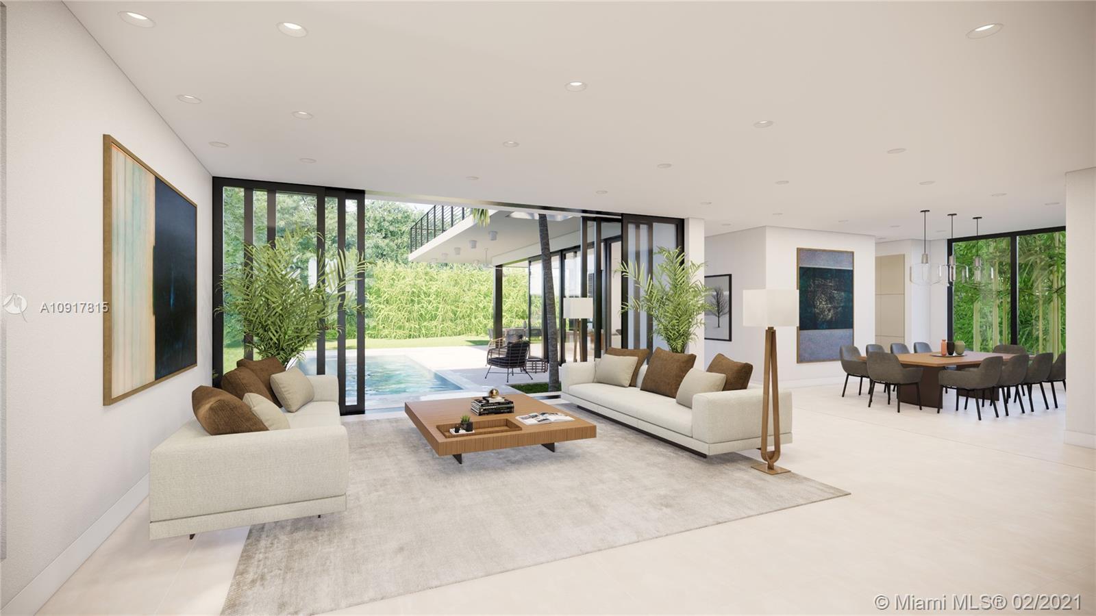 3601 Solana Road Miami, FL 33133 - Photo 2 of 7 a living room with furniture and large windows