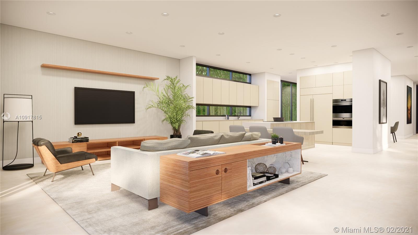 3601 Solana Road Miami, FL 33133 - Photo 3 of 7 a living room with furniture and a flat screen tv