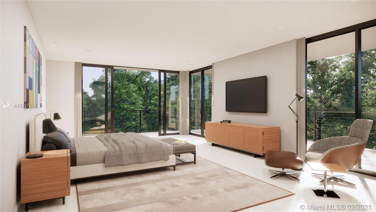 3601 Solana Road Miami, FL 33133 - Photo 4 of 7 a bedroom with a bed and large window