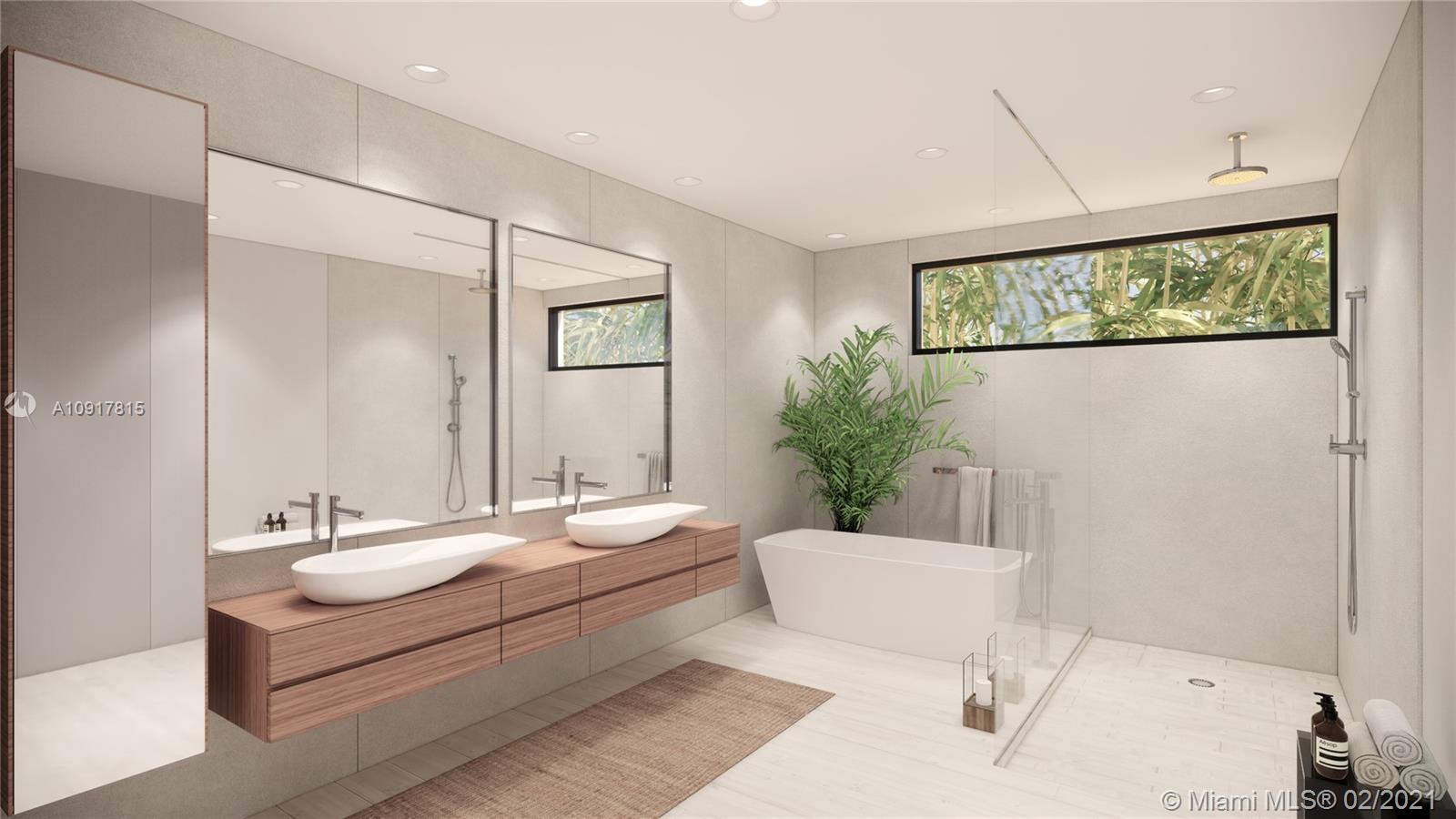 3601 Solana Road Miami, FL 33133 - Photo 5 of 7 a bathroom with a sink and a mirror