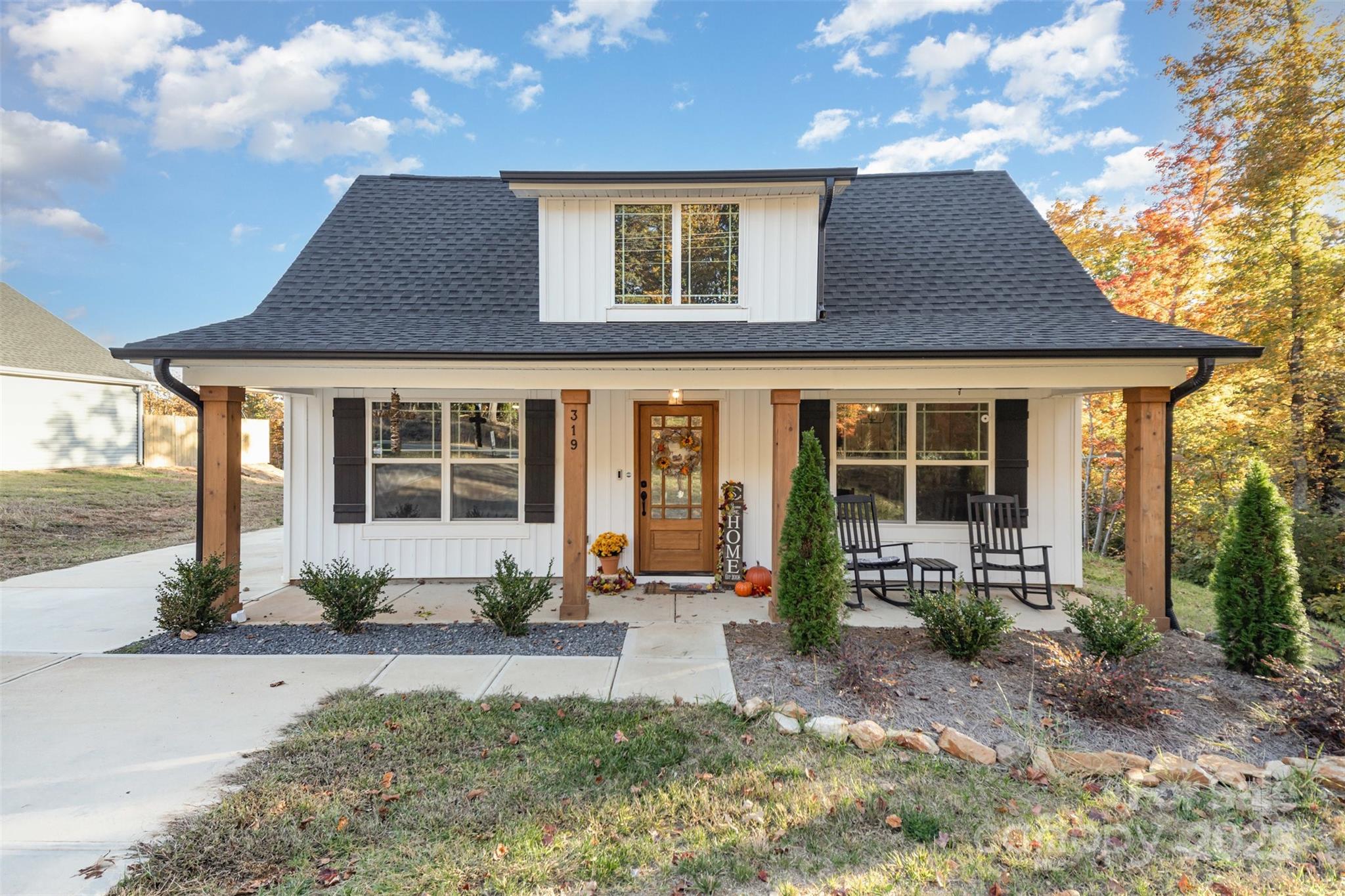 319 Pinnacle Road Kings Mountain, NC 28086 - Photo 1 of 22 a front view of a house with a garden and porch