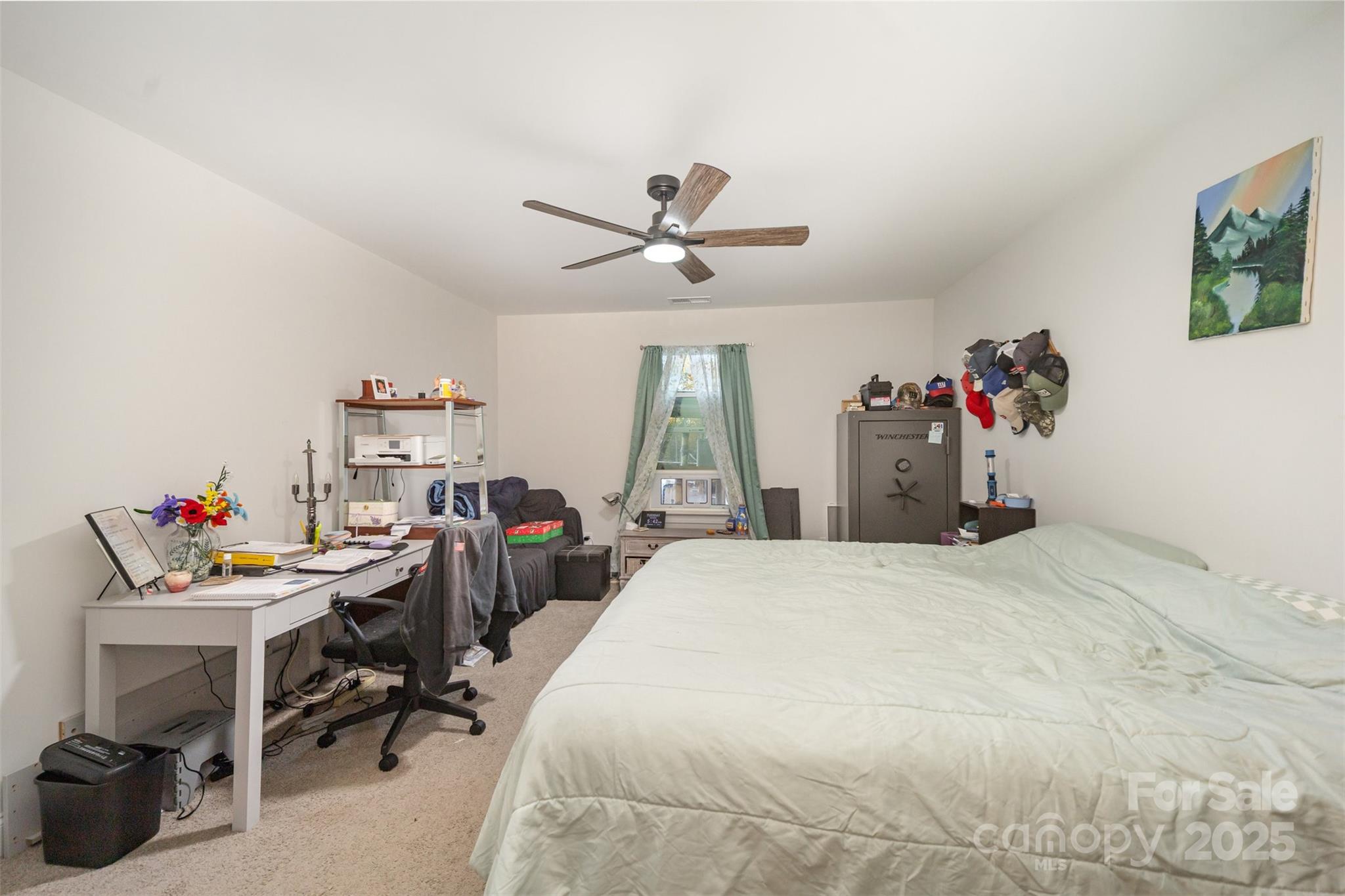 319 Pinnacle Road Kings Mountain, NC 28086 - Photo 11 of 22 a bedroom with a bed and a chandelier