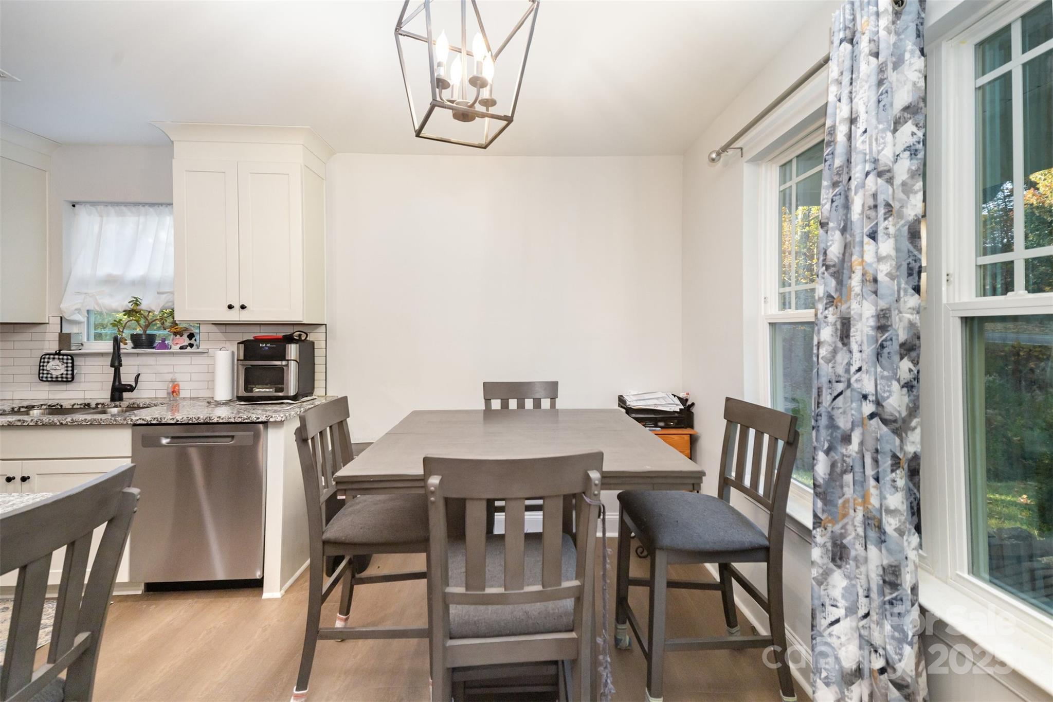 319 Pinnacle Road Kings Mountain, NC 28086 - Photo 4 of 22 a view of a dining room with furniture window and wooden floor