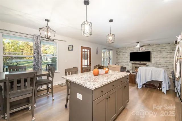 a view of living room and kitchen