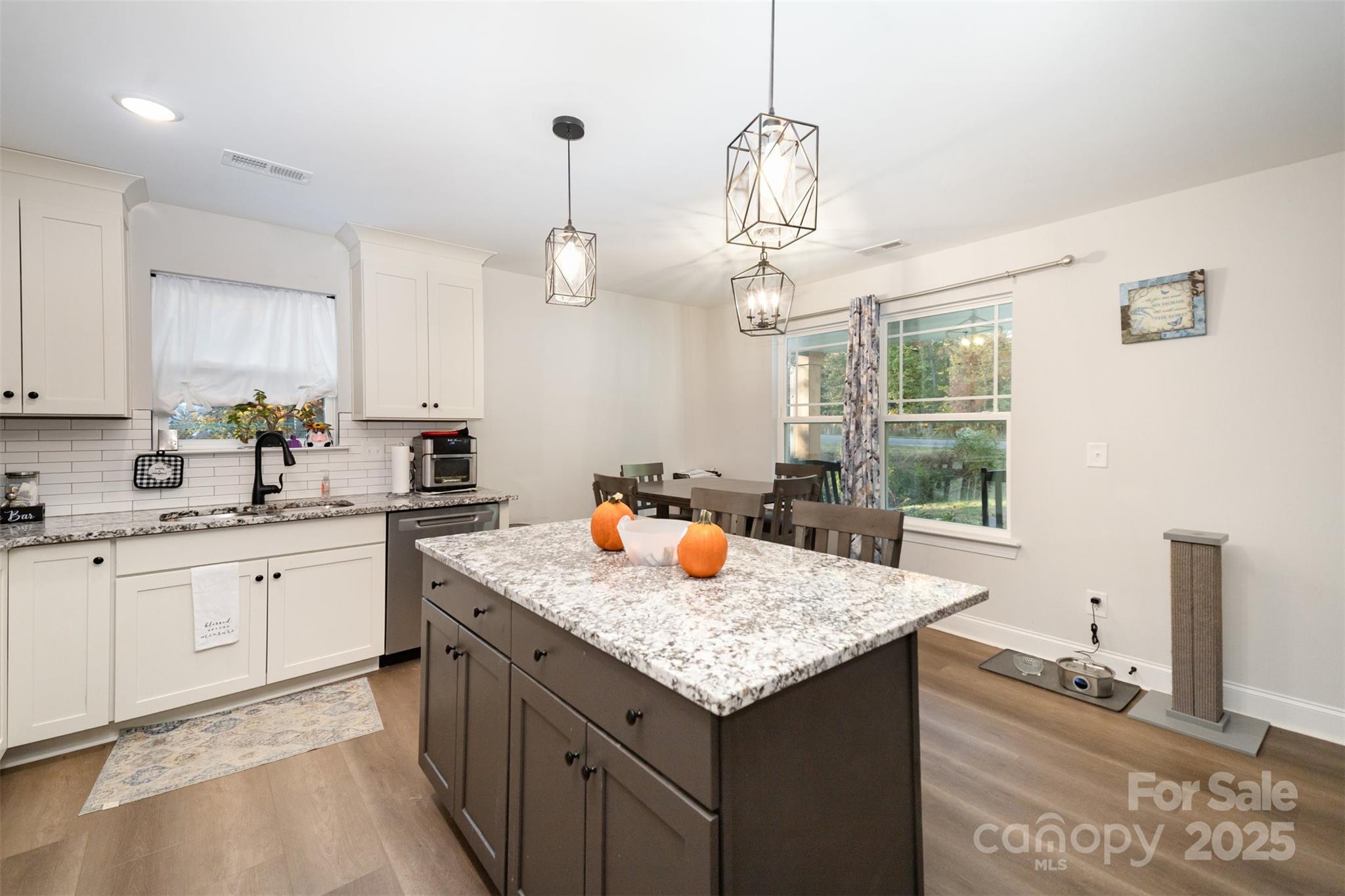 319 Pinnacle Road Kings Mountain, NC 28086 - Photo 8 of 22 a kitchen with granite countertop kitchen island stainless steel appliances a sink stove and kitchen island
