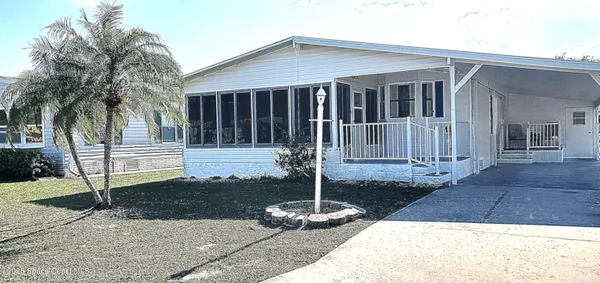 a front view of a house having yard