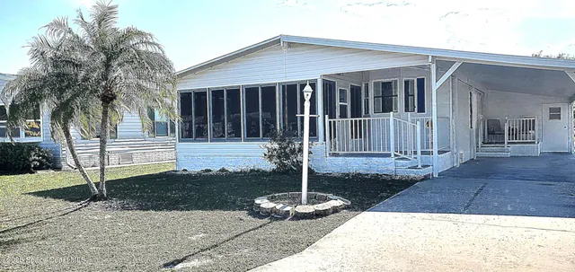 a front view of a house having yard