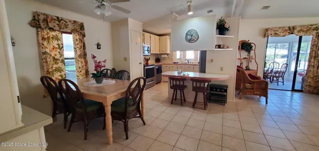 a view of a dining room with furniture