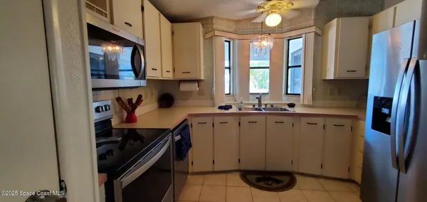 a bathroom with a sink a vanity and a mirror