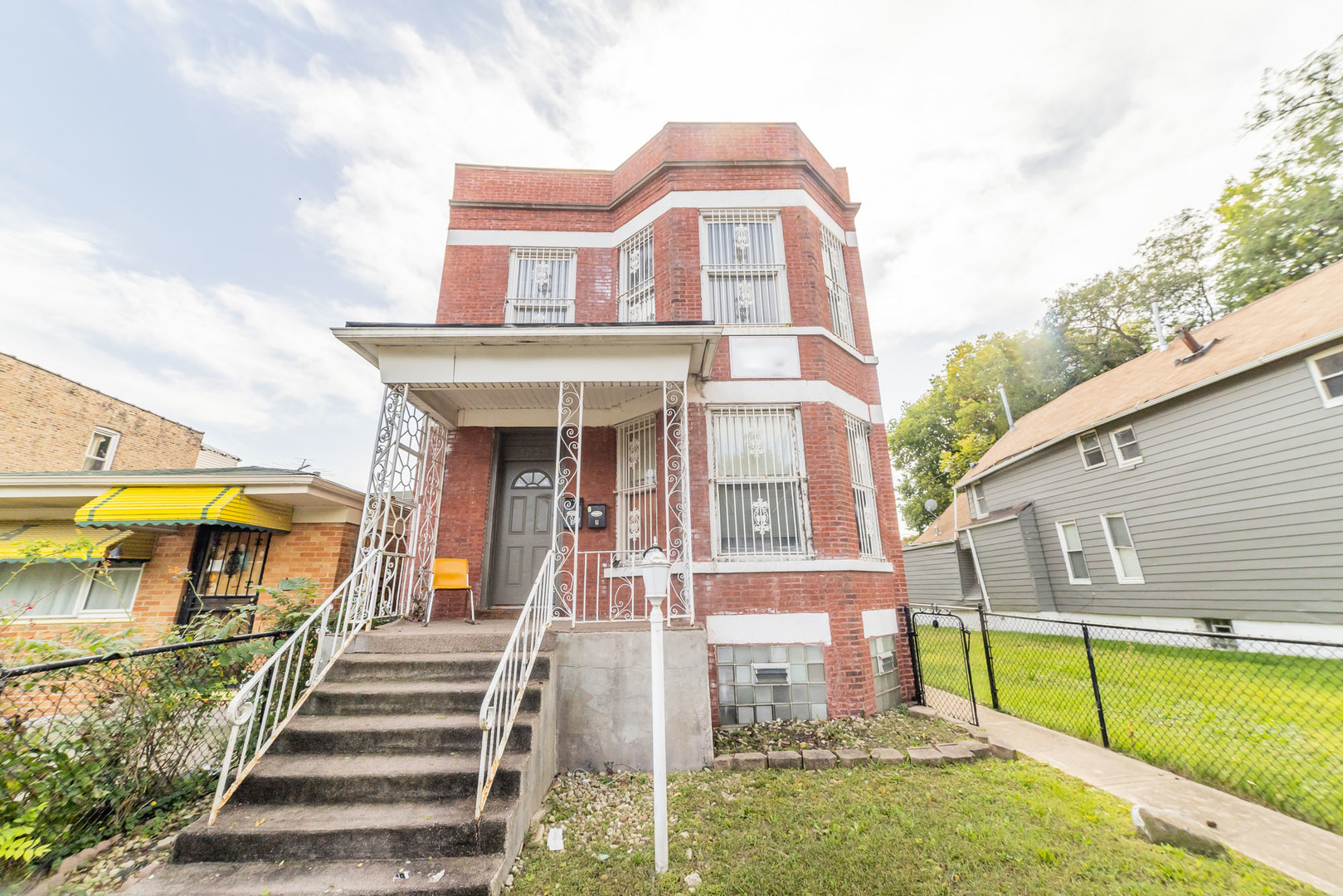 1229 East 71st Street Chicago, IL 60619 - Photo 1 of 14