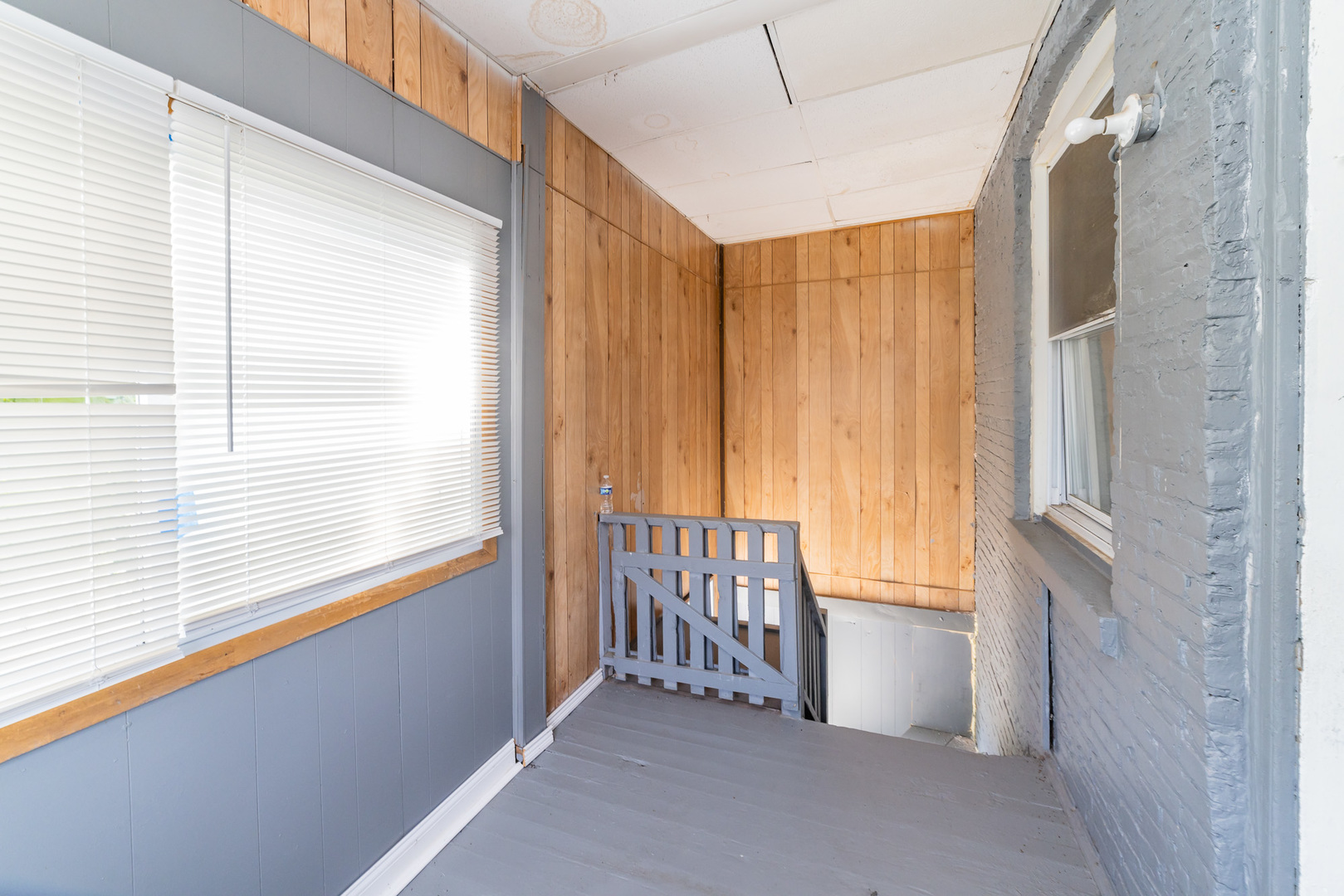 1229 East 71st Street Chicago, IL 60619 - Photo 12 of 14 a view of a hallway with windows