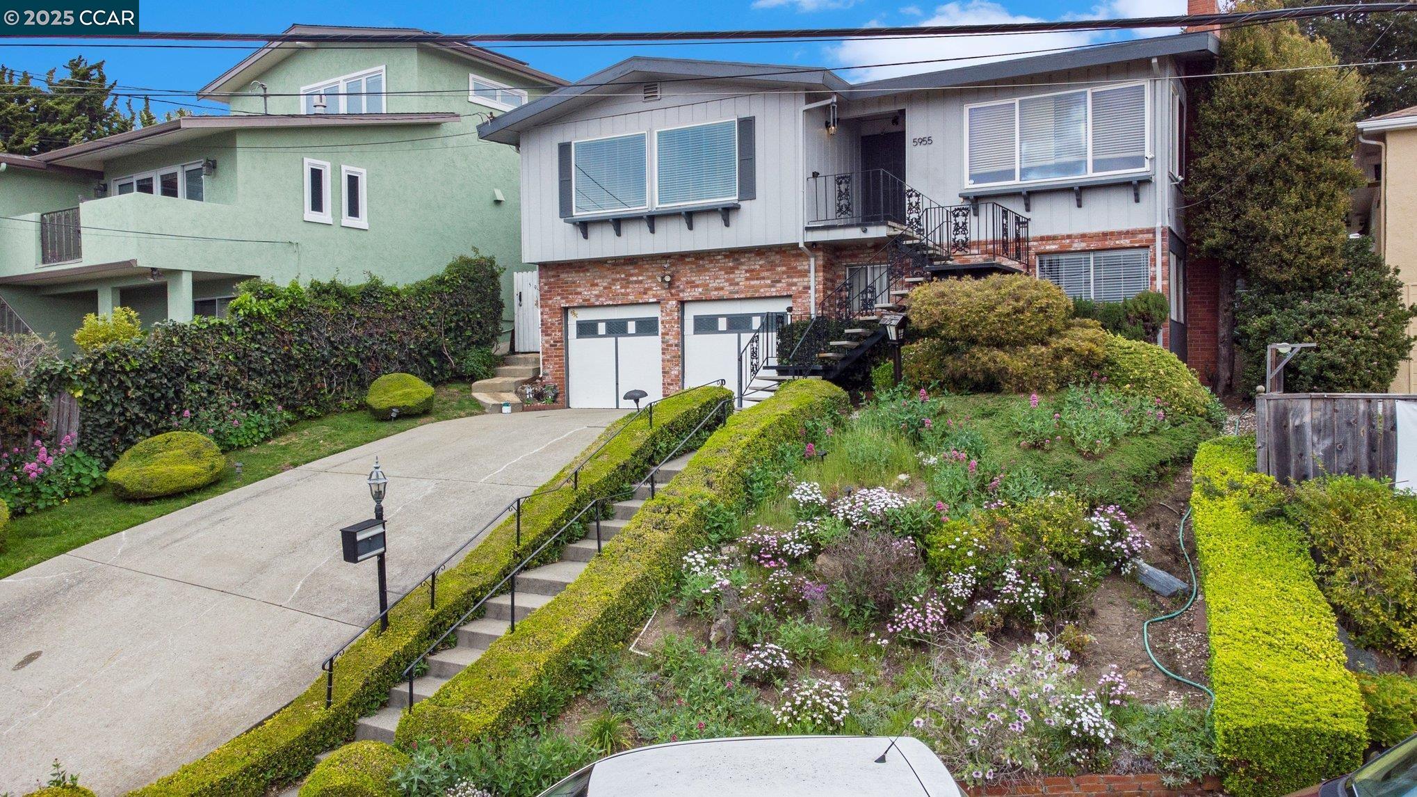 5955 Ralston Avenue Richmond, CA 94805 - Photo 2 of 47 a view of a house with a yard and potted plants