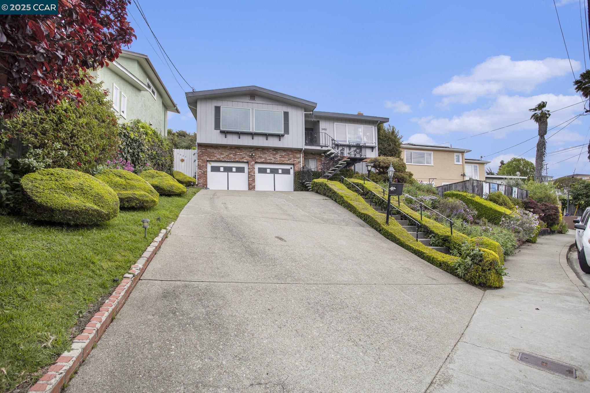 5955 Ralston Avenue Richmond, CA 94805 - Photo 44 of 47 a view of a house with a yard and potted plants