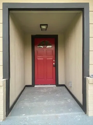 a view of a red door of the house