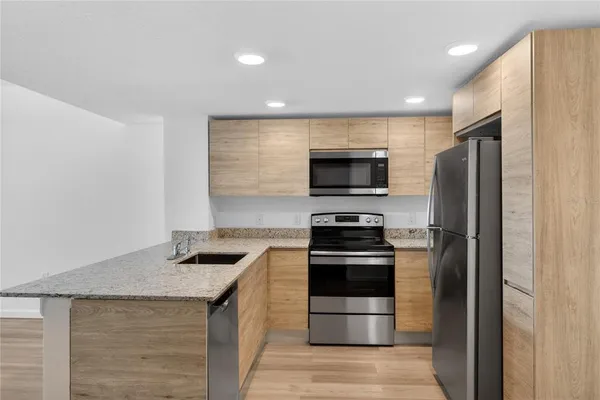 a view of wooden floor in an empty room